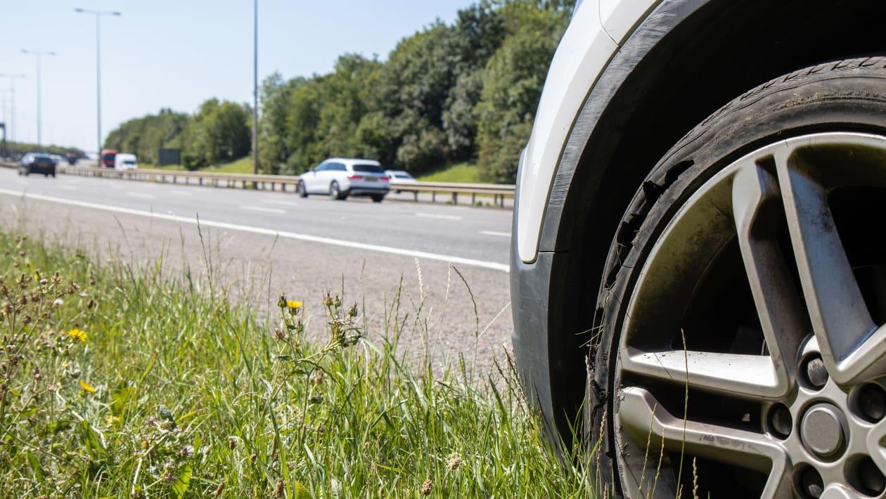 front tyre of a car punctured 